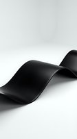 Elegant black curved ribbon flowing gracefully on white background creating dynamic wave motion for modern design projects and creative presentations.