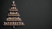 Creative Christmas tree made from vintage Edison light bulbs arranged in pyramid shape on dark background for holiday decorations and festive lighting design.