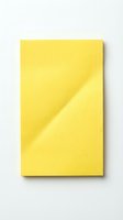 Bright yellow adhesive note with folded corner on white background, suitable for office, business, and organizational design projects.