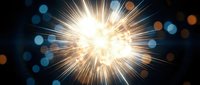 Bright starburst explosion with golden rays and colorful bokeh lights on dark background for celebration designs and festive projects.