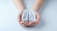 Hands protecting glowing lungs symbol representing respiratory health, medical care, and lung disease prevention concepts for healthcare awareness campaigns.