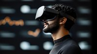 Middle Eastern man wearing virtual reality headset smiling against dark background with bokeh lights, experiencing immersive technology in modern setting.