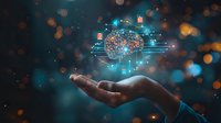 Digital brain hologram floating above open hand against dark background with bokeh lights, representing artificial intelligence and future technology in business innovation.