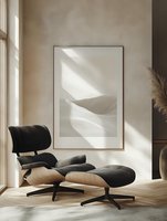 Minimalist interior with black lounge chair and ottoman on wooden floor, framed abstract artwork on beige textured wall, natural sunlight casting shadows, modern home decor.