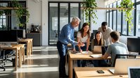 Young diverse team collaborating at wooden table in modern office space with natural light, discussing project ideas and sharing creative solutions for business development.