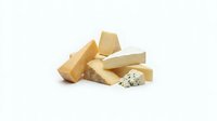 Assorted cheese wedges and blocks including cheddar, aged varieties, and blue cheese isolated on white background for food photography and culinary design.