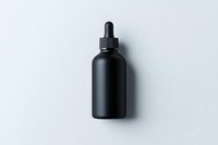 Matte black dropper bottle isolated on white background, minimalist cosmetic packaging mockup for skincare, essential oils or medical products.