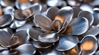 Metallic silver flower petals in elegant arrangement with dramatic lighting and reflective surfaces creating abstract artistic composition. Suitable for luxury designs.