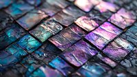 Iridescent metallic tiles with purple and blue reflective surface creating abstract geometric pattern. Textured mosaic background with holographic effect.