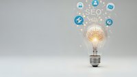 Digital marketing lightbulb with glowing brain and SEO icons floating above on neutral background for business innovation and online strategy concepts.