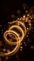 Golden light trails swirling in spiral motion with sparkling particles and bokeh effects on dark background for luxury design projects.