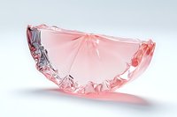 Pink translucent crystal slice in semicircle shape with faceted edges casting soft shadows on white background, modern minimal design element for luxury branding.