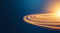 Glowing orange light trails curve against dark blue background creating dynamic motion effect with bright energy streams and luminous spiral paths.