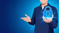 Professional businessman presenting cybersecurity lock symbol on blue digital background for data protection and network security solutions.