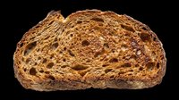 Toasted whole grain bread slice isolated on transparent background, ready for food design, stickers, print on demand, clipart, and T-shirt use.