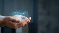 Businessman hand holding digital network connection hologram for technology, data transfer, and communication concepts.