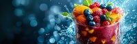 Fresh mixed berries and fruit chunks in splashing water with vibrant colors against dark blue background, panoramic composition for food and beverage marketing.