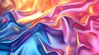 Vibrant flowing silk fabric in pink, blue and orange creates dynamic waves and folds with glossy metallic sheen, abstract luxury background pattern.