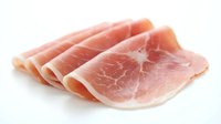 Fresh sliced ham deli meat arranged on white background, isolated protein food ingredient for sandwiches and cooking recipes.