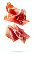 Thin slices of cured prosciutto ham floating in air on white background, isolated food photography for restaurant menu and culinary design projects.