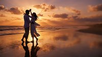 Romantic couple silhouette dancing on beach at golden sunset with ocean waves and dramatic sky reflection on wet sand creating intimate moment.