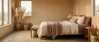 Cozy minimalist bedroom interior with warm beige tones, natural textures, wooden furniture and pampas grass decor creating serene sleeping space.