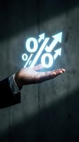 Businessman hand holding glowing percentage symbols with upward arrows, representing growth, profit increase, and financial success for business and investment concepts.