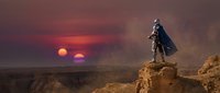 Futuristic warrior in armor and cape standing on rocky cliff overlooking alien desert landscape with twin suns at sunset creating dramatic sci-fi scene.