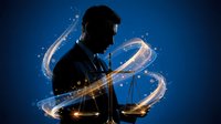 Young male DJ with headphones creating magical light trails while mixing music on turntables against blue background for entertainment industry projects.