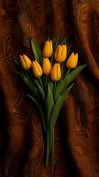 Yellow tulip bouquet on brown embroidered fabric background, fresh spring flowers with green leaves arranged in elegant composition for floral design.