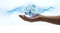 Hand holding atom symbol with blue digital waves and particles, representing science, technology, research, innovation, and atomic energy for educational and corporate applications.
