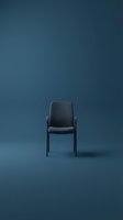 Modern gray upholstered chair with armrests on blue background, suitable for interior design, furniture catalogs, office spaces, and contemporary home decor projects.