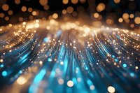 Abstract fiber optic cables with glowing particles and bokeh lights creating dynamic technology background for digital communications and data transfer.