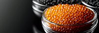 Fresh red caviar in glass bowl on dark background with dramatic lighting, luxury gourmet seafood delicacy close up with copy space for menu design.