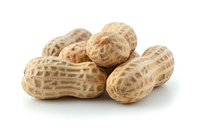 Whole peanuts in shells isolated on white background, showing natural texture and detail of unshelled groundnuts for food ingredient photography.