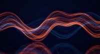 Abstract flowing light waves in orange and blue colors creating dynamic energy patterns on dark background for modern digital design projects.