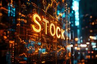 Glowing orange neon stock market sign against dark urban background with financial data overlay and bokeh lights creates dramatic trading atmosphere.