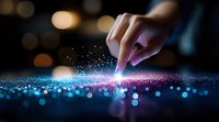 Finger touching glowing sparkles on dark surface with magical blue and pink light effect, creating ethereal bokeh pattern. For fantasy and technology concepts.
