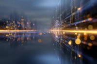 Abstract digital landscape with glowing golden light streaks and bokeh particles reflecting on dark surface, creating futuristic horizon perspective.
