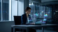 Professional businesswoman working with holographic data visualization and laptop in modern office environment for technology presentations.