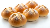 Fresh baked bread rolls with golden crust isolated on white background for bakery menu design and culinary projects.