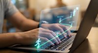 Business professional analyzing financial growth charts on laptop with glowing data visualization overlay for investment and market analysis presentations.