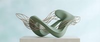 Abstract green sculptural form with translucent wire mesh wings on white pedestal against soft blue background, contemporary art installation for gallery and design projects.