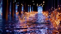 Wet urban street at night with golden bokeh lights reflecting on pavement, creating atmospheric ambiance for backgrounds, overlays, and mood-setting designs.