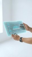 Male professional holding transparent turquoise digital tablet displaying future readiness framework with agility, skills, innovation, and sustainability icons for business strategy and corporate development.