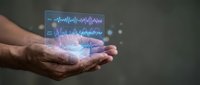 Male hand holding holographic audio waveform display with sound frequency visualization for music production, podcast editing, and digital audio technology concepts.