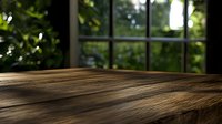 Rustic wooden table surface with natural sunlight streaming through window, green garden bokeh background creates cozy atmosphere for product photography.