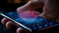 Glowing pink heart shape formed by digital particles emerging from smartphone screen in dark environment, symbolizing modern love and digital connection.