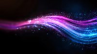 Glowing neon waves with sparkling particles flow through dark space creating magical light trails in pink and blue colors against black background.
