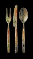 Vintage cutlery set with fork, knife, and spoon featuring weathered metal heads and wooden handles with aged patina. Isolated on transparent background, ready for t-shirts, clipart, stickers, and print-on-demand designs.